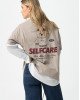 Футболка oversize бежевого цвета с принтом на спине
