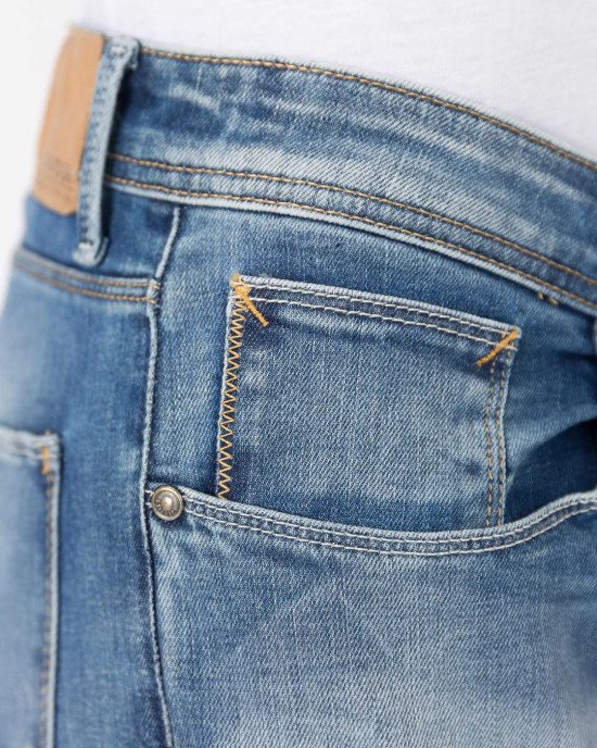 Джинсы slim fit синего цвета