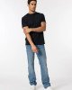 Джинсы regular fit свободного кроя 