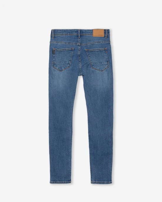 Джинсы skinny fit синего цвета с потертостями 