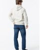 Джинсы relaxed fit синего цвета с эффектом потертостей 